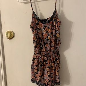 Black with flowers romper